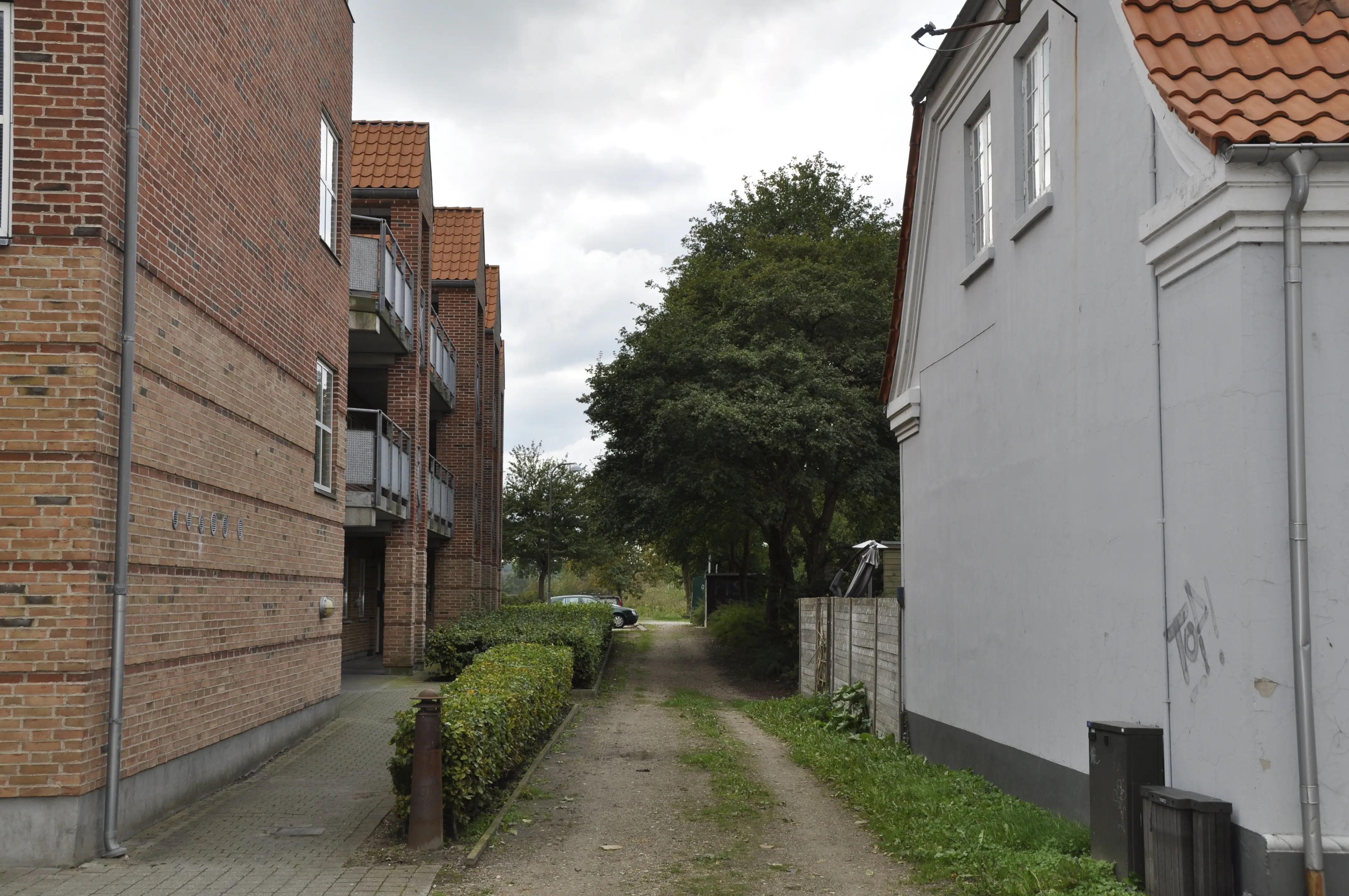 Billede af Aabenraa Sønderport Trinbræt, som lå til højre for træerne i midten af billedet. Billede af Aabenraa Sønderport Trinbræt, som lå til højre for træerne i midten af billedet.