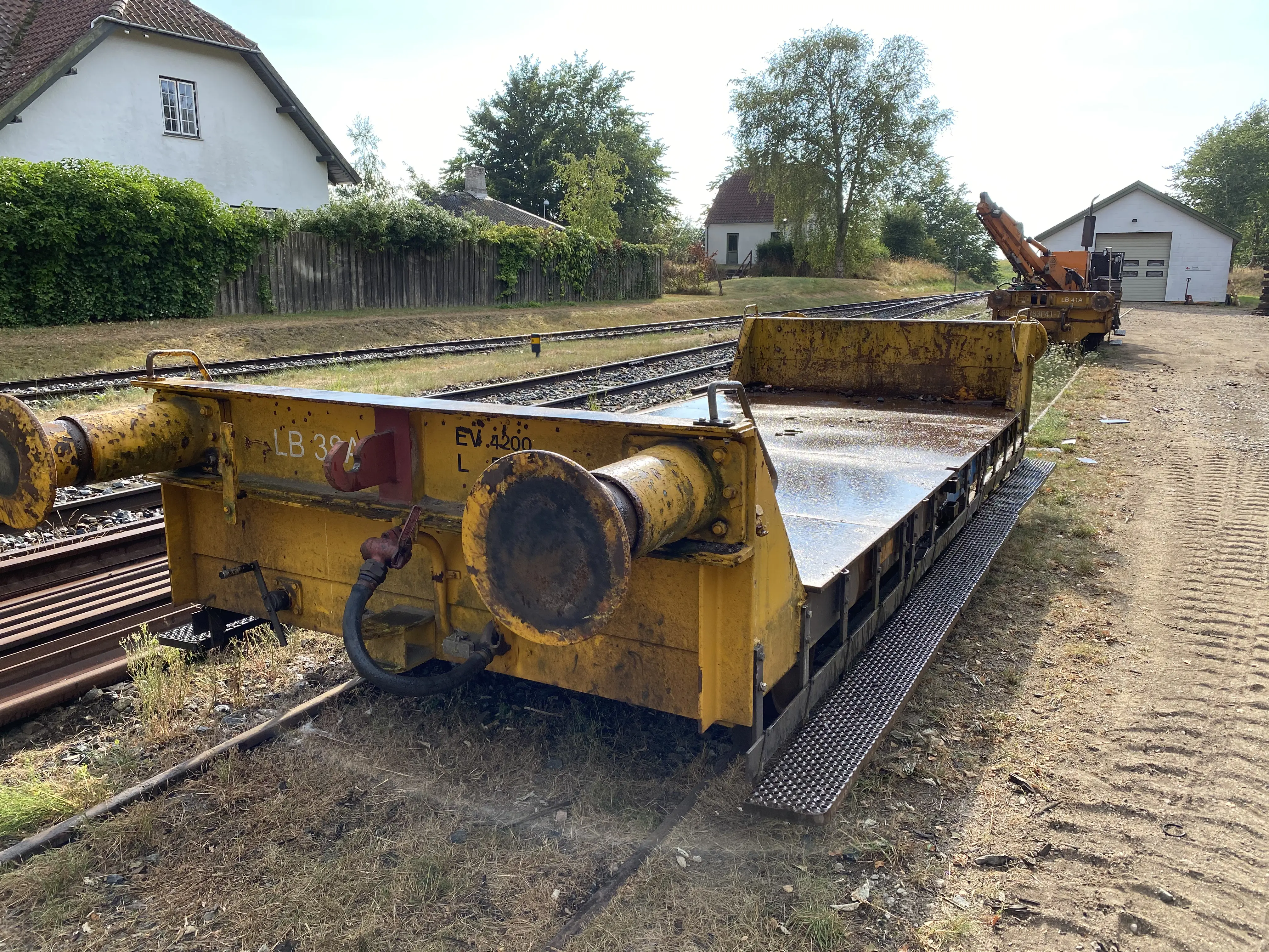 Billede af tog ud for Firhøj Station.